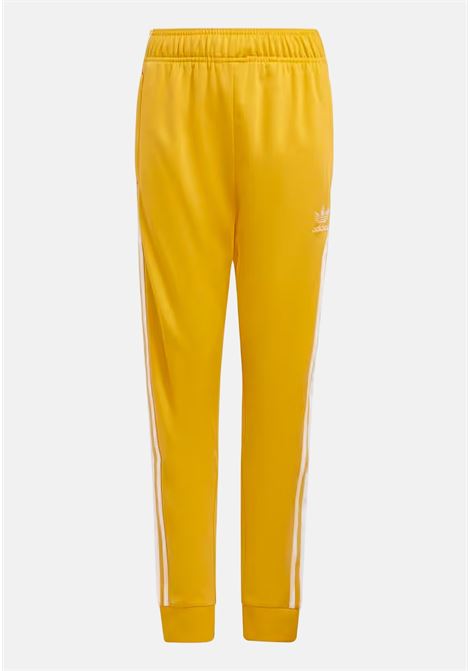 Pantalone sportivo Adicolor SST arancio per bambino e bambina ADIDAS ORIGINALS | IY7459.